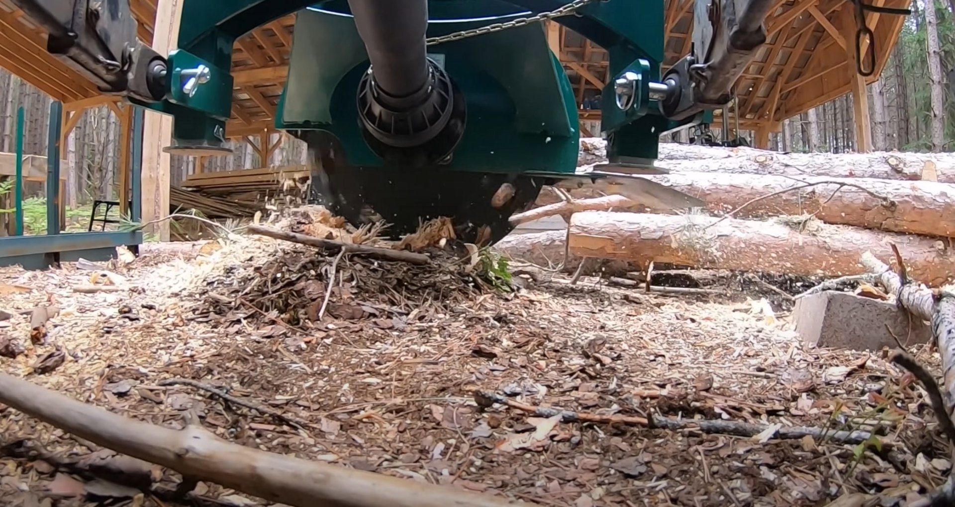 Professional sawmill operation showing precision tree cutting and processing equipment